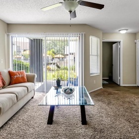 a living room with a couch and a table