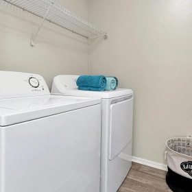 a washer and dryer in a closet