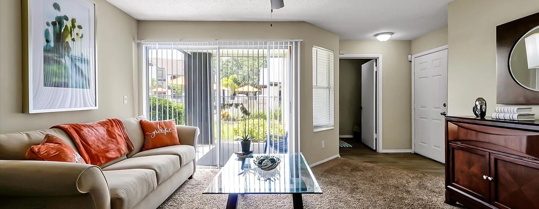 a living room with a couch and a table