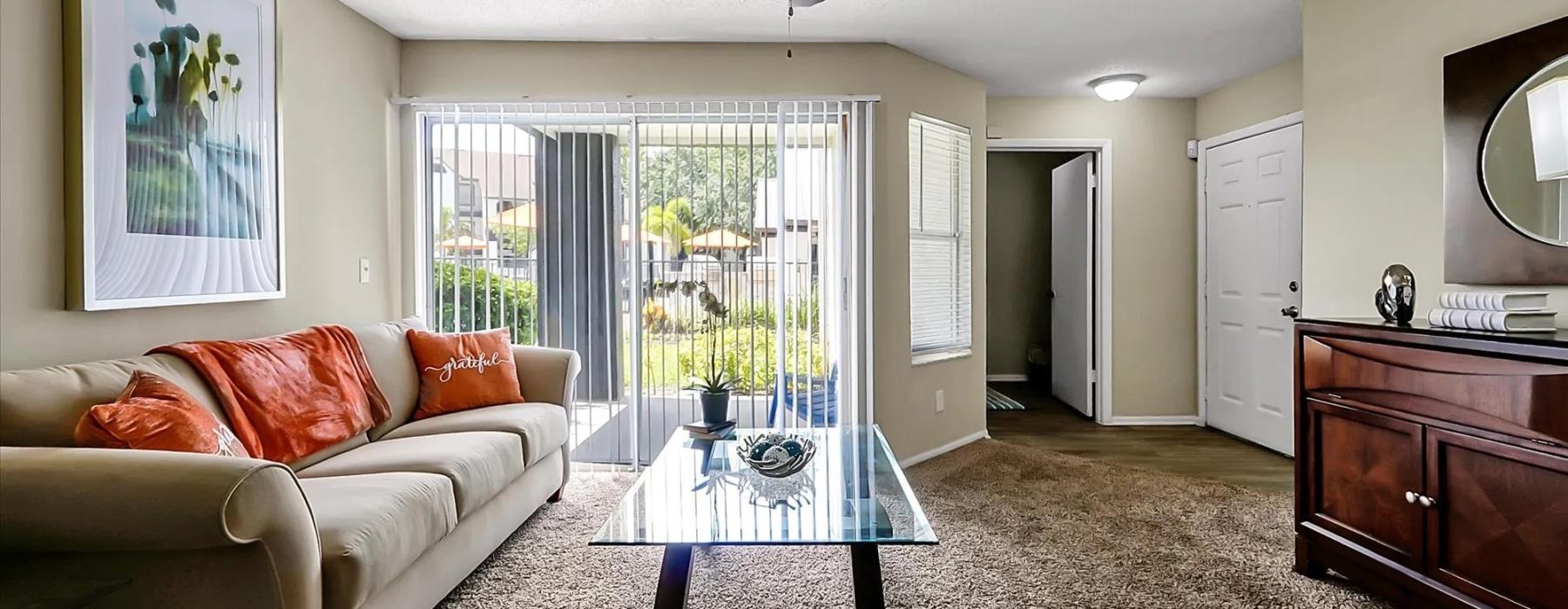a living room with a couch and a table